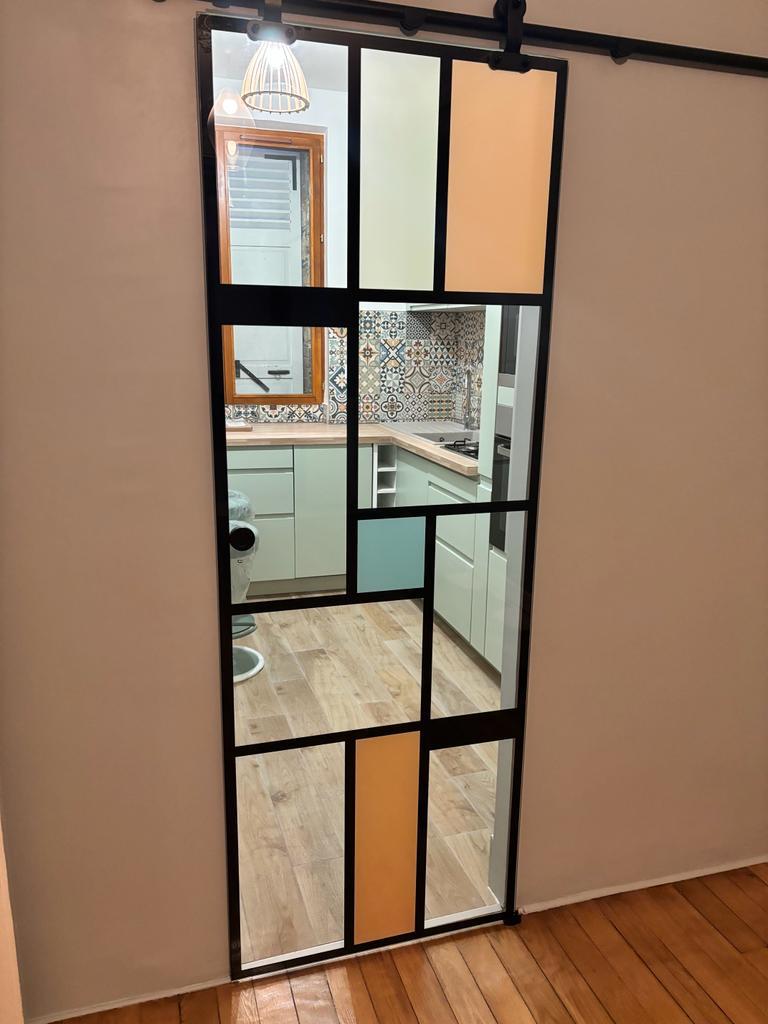 Installation de porte coulissante cuisine